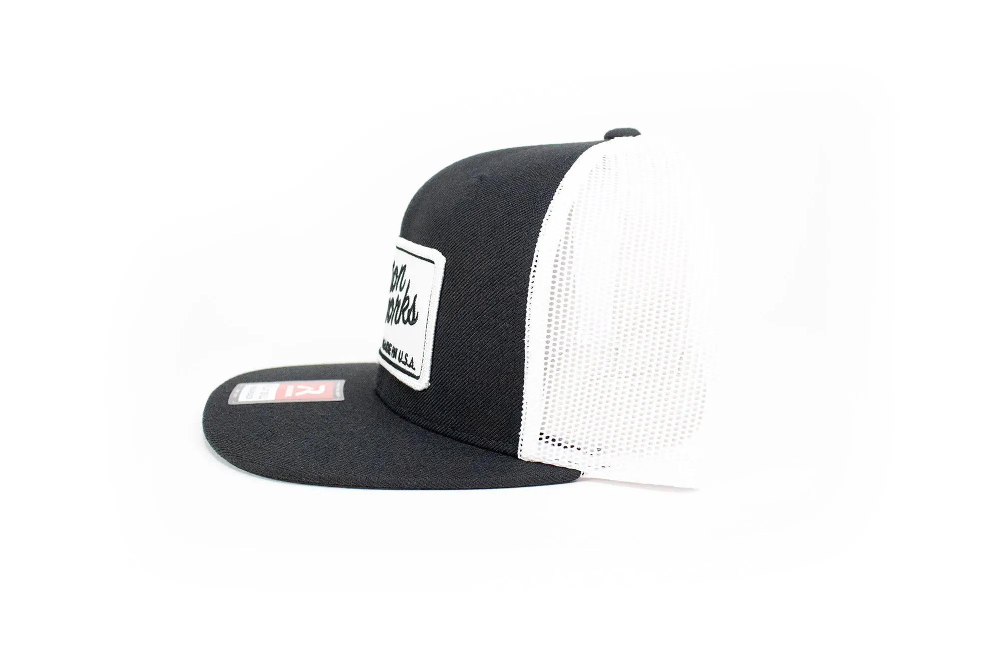 Motion Heritage Flat Bill Hat Black/White Snapback